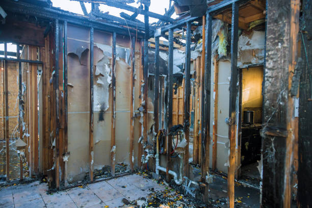 Professional Fire Damage Restoration technician working in Oskaloosa, IA